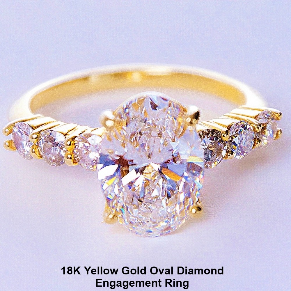 18k-yellow-gold-oval-diamond-engagement-ring 18k yellow gold oval diamond engagememnt ring